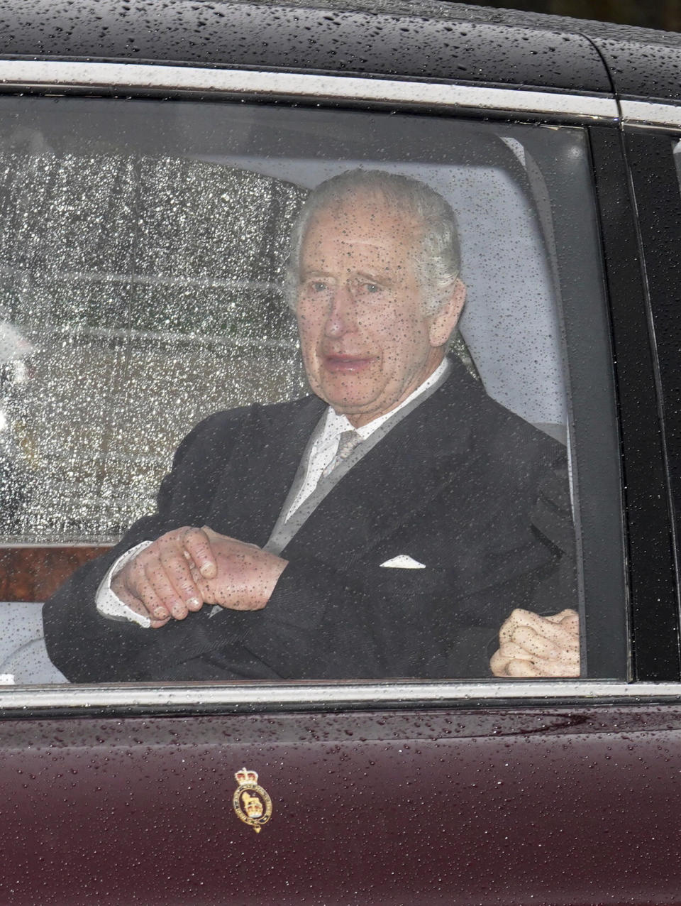 Britain's King Charles III arrives back at Clarence House in London, Tuesday Feb. 13, 2024 after spending a week at Sandringham in Norfolk, following the announcement of King Charles III's cancer diagnosis. (Jordan Pettitt/PA via AP)
