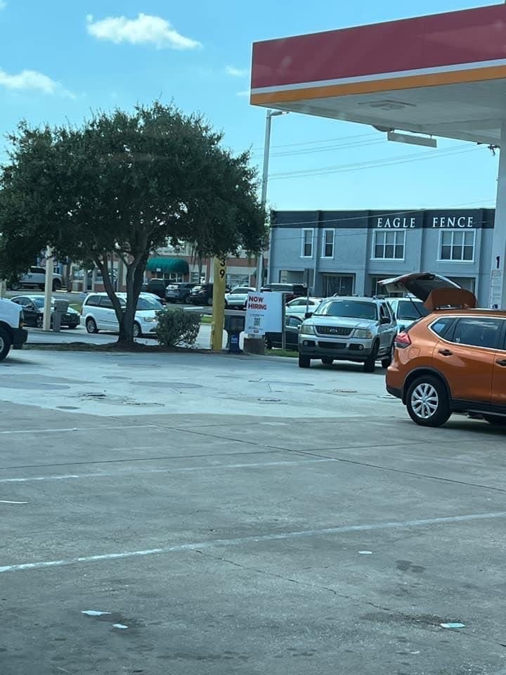 A line of cars formed at the Circle K near Industrial Park in Cape Coral today, Friday, Sept. 23, 2022, as people prepared for a possible hurricane next week.