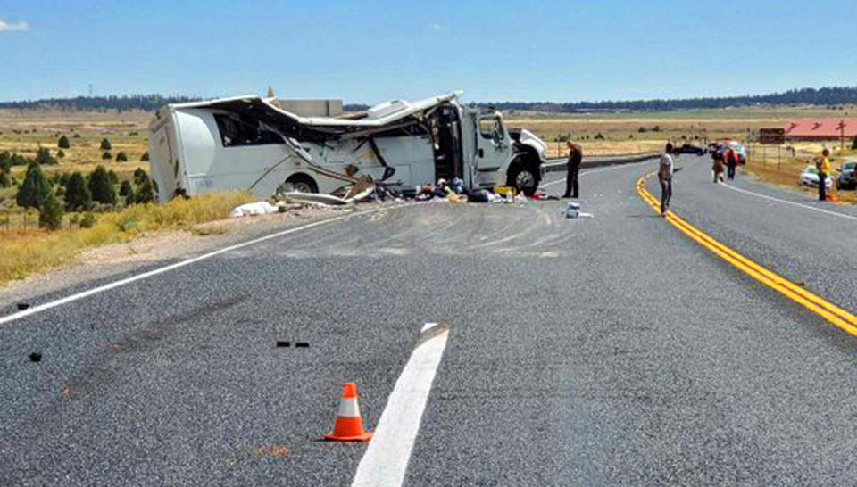 This photo released by the Utah Highway Patrol shows a tour bus carrying Chinese-speaking tourists after it crashed near Bryce Canyon National Park in southern Utah, killing at least four people and critically injuring up to 15 others, Friday, Sept. 20, 2019. (Utah Highway Patrol via AP)