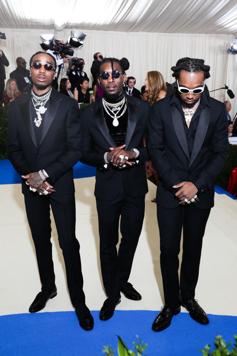 <h1 class="title">Migos in Versace</h1><cite class="credit">Photo: BFA/Shutterstock</cite>