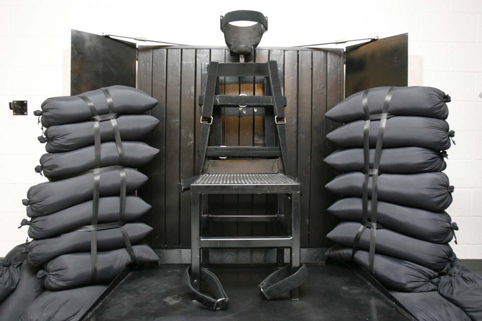 FILE - A chair sits in the execution chamber at the Utah State Prison on June 18, 2010, after Ronnie Lee Gardner was executed by firing squad in Draper, Utah. Idaho lawmakers passed a bill on March 20, 2023, that would authorize the use of firing squads if the state is unable to obtain drugs required for its lethal injection program. The bill will head to the desk of Idaho Gov. Brad Little next. (Trent Nelson/The Salt Lake Tribune via AP, Pool, File)