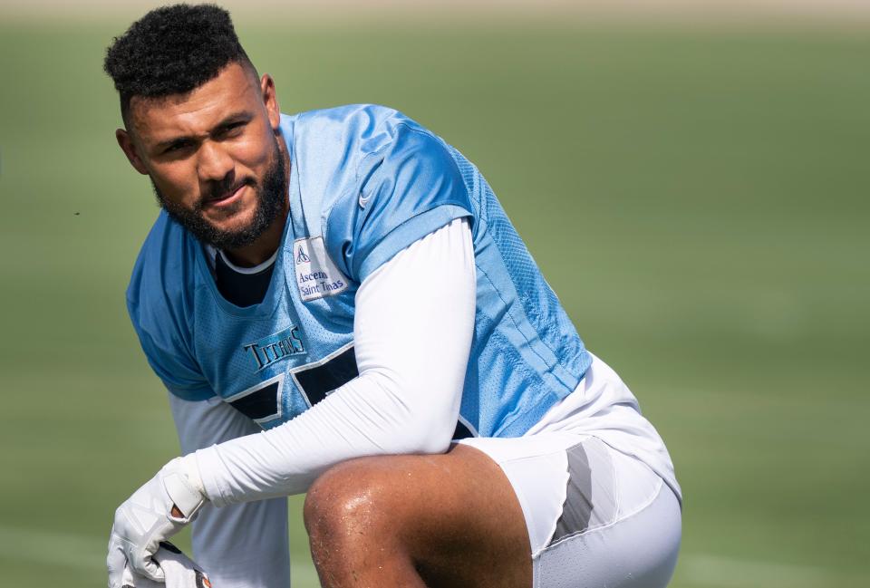 Tennessee Titans outside linebacker Harold Landry (58) warms up during practice at Saint Thomas Sports Park Wednesday, June 15, 2022, in Nashville, Tenn. 