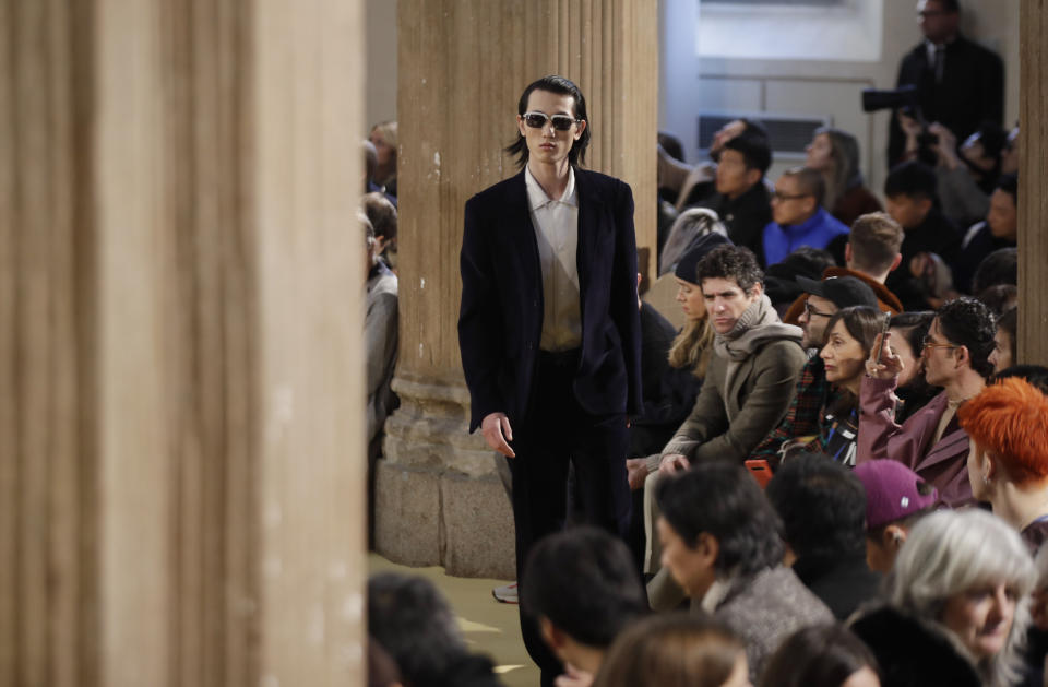 A model wears a creation part of the Salvatore Ferragamo men's Fall-Winter 2020/21 collection, that was presented during the fashion week, in Milan, Italy, Sunday, Jan. 12, 2020. (AP Photo/Luca Bruno)