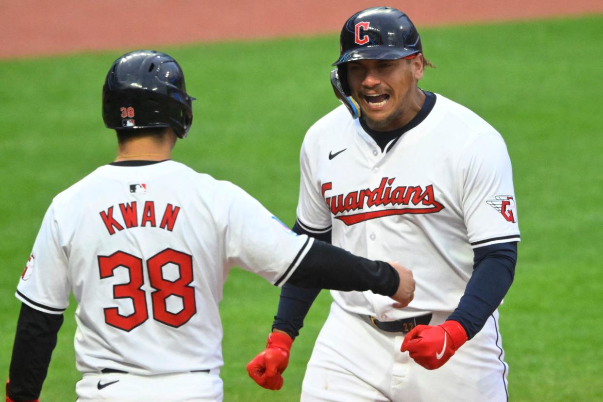 Guardians designated hitter Josh Naylor celebrates his two-run home run with left fielder Steven Kwan (38) in the fifth inning against the Oakland Athletics, April 20, 2024, in Cleveland.