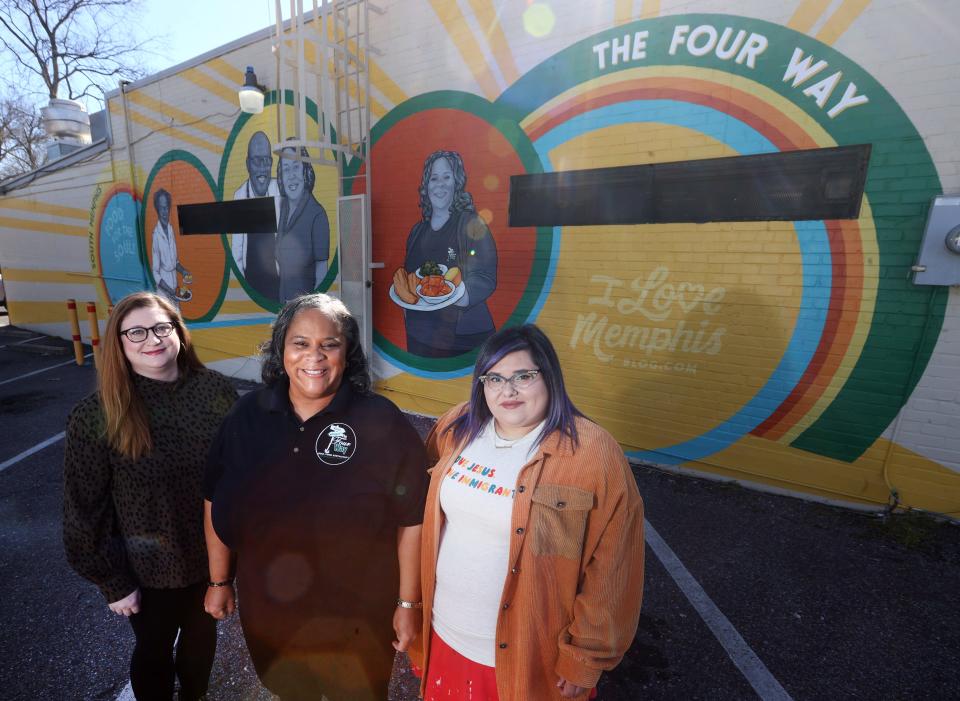 Holly Whitfield of the I Love Memphis Blog, from left, Patrice Thompson owner of the Four Way and mural artist Danielle Sierra stand in front of the restaurant's new mural during Black History Month, paying tribute to its 75 years of business in the Soulsville community. 
