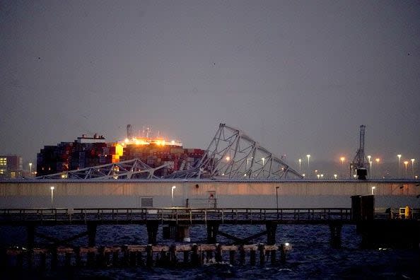 The Dali container vessel after striking the Francis Scott Key Bridge that collapsed into the Patapsco River in Baltimore, Maryland, US, on Tuesday, March 26, 2024. The commuter bridge collapsed after being rammed by the Dali ship, causing vehicles to plunge into the water. Photographer: Al Drago/Bloomberg via Getty Images