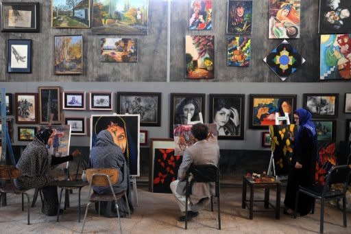 Afghan youths learn how to paint at the Behzad Art Gallery in Herat. A call by Afghan President Hamid Karzai for more foreign involvement in the country's higher education system risks exacerbating an already dangerous brain drain, analysts warn