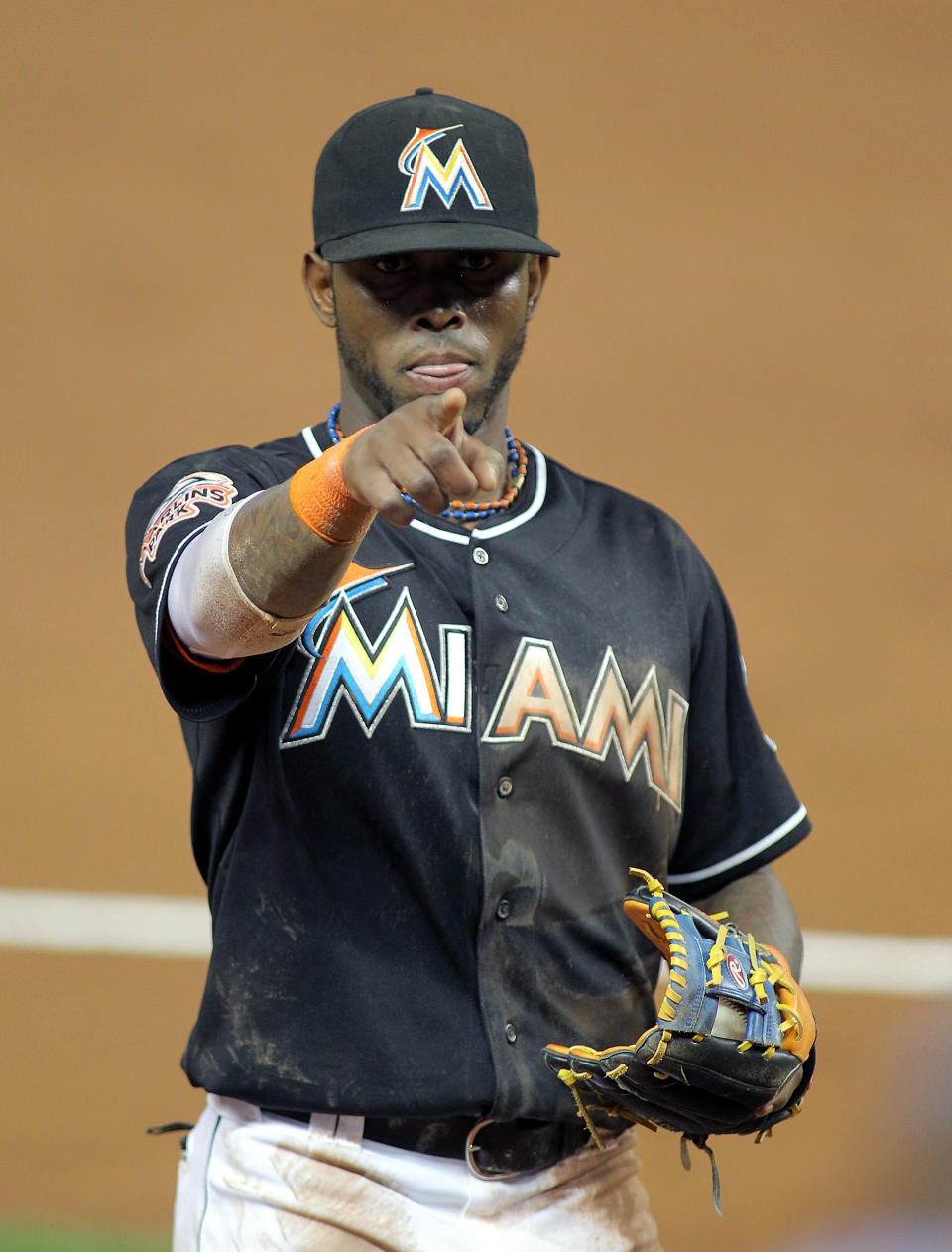MIAMI, FL - APRIL 13: Shortstop Jose Reyes #7 of the Miami Marlins points to a fan during a game against the Houston Astros at Marlins Park on April 13, 2012 in Miami, Florida. (Photo by Marc Serota/Getty Images)