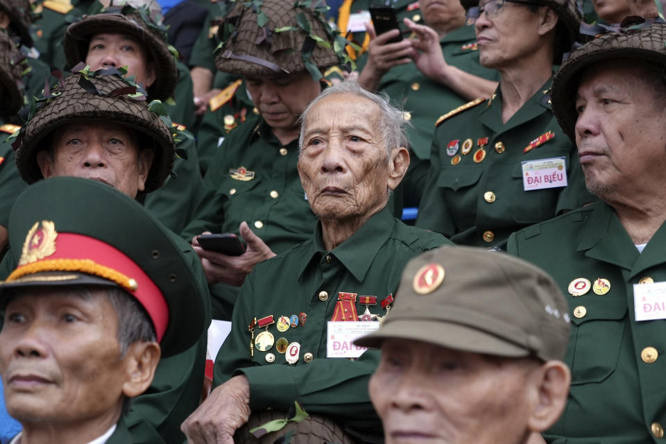 Veterans attend a parade commemorating the victory of Dien Bien Phu battle in Dien Bien Phu, Vietnam, Tuesday, May 7, 2024. Vietnam is celebrating the 70th anniversary of the battle of Dien Bien Phu, where the French army was defeated by Vietnamese troops, ending the French colonial rule in Vietnam. (AP Photo/Hau Dinh)
