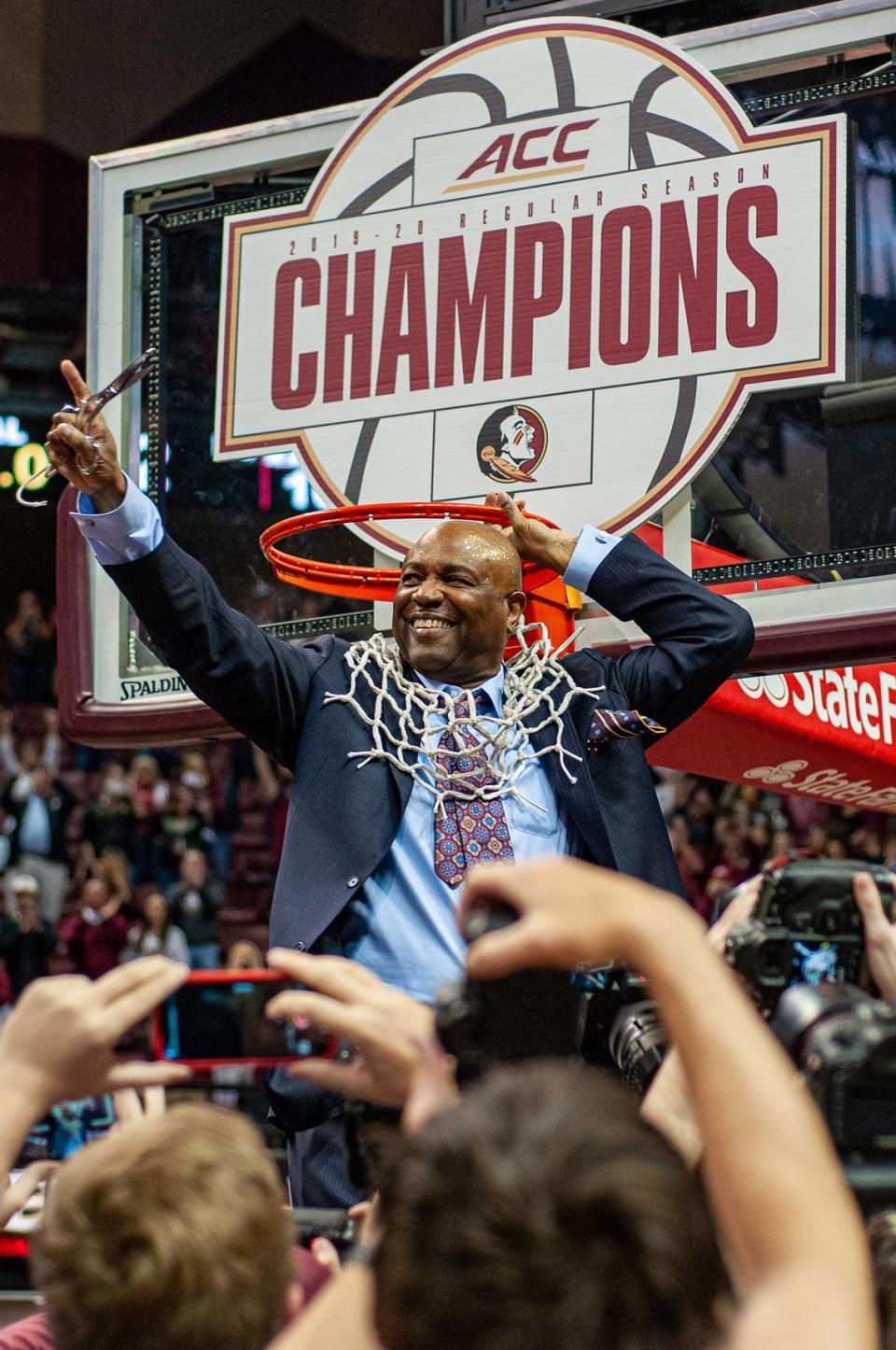 Florida State coach Leonard Hamilton celebrates an ACC championship. Hamilton, who grew up in Gastonia, N.C., has had a coaching career spanning more than 50 years and has been the Seminoles’ head coach since 2002.