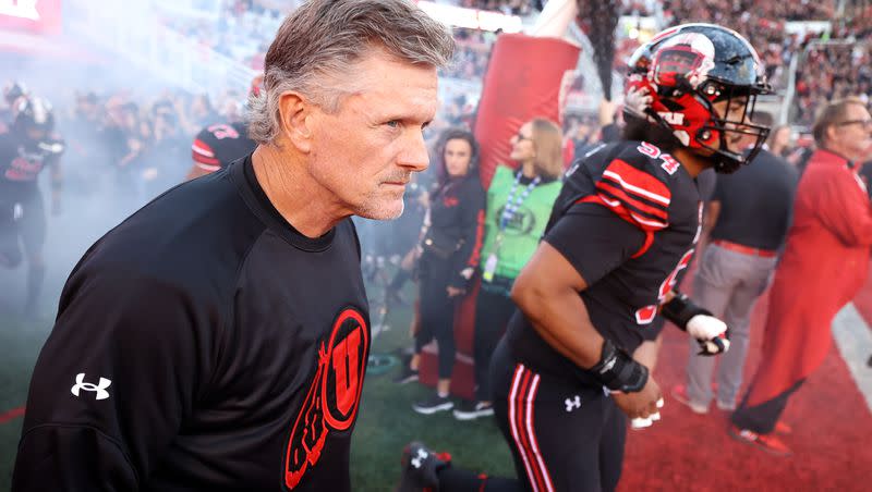 Utah Utes head coach Kyle Whittingham runs out with his team as Utah and USC play at Rice-Eccles Stadium in Salt Lake City on Saturday, Oct. 15, 2022.