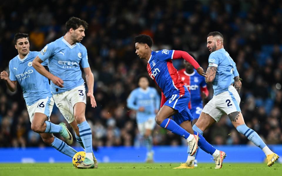Matheus Franca of Crystal Palace and Kyle Walker, Ruben Dias, Rodri of Manchester City in action during the Premier League match between Manchester City and Crystal Palace at Etihad Stadium on December 16, 2023 in Manchester, United Kingdom