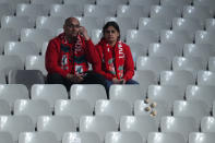 Liverpool supporters are dejected after the Champions League final soccer match between Liverpool and Real Madrid at the Stade de France in Saint Denis near Paris, Saturday, May 28, 2022. Real won 1-0. (AP Photo/Petr David Josek)