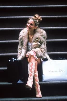 Season 3: Classic Carrie: fur coat, funky boots and a Christian Dior bag.