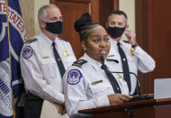 Assistant Chief for Protective and Intelligence Operations Yogananda Pittman, center, flanked by U.S. Capitol Police Chief Tom Manger, left, and Acting Assistant Chief for Uniformed Operations Sean Gallagher, speaks during a news conference to discuss preparations for a weekend rally planned by allies of Donald Trump who support the so-called "political prisoners" of the Jan. 6 attack on the Capitol, Friday, Sept. 17, 2021, at the Capitol in Washington, (AP Photo/J. Scott Applewhite)