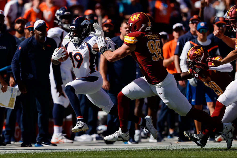 Denver Broncos wide receiver Marvin Mims Jr. (19) is pushed out of bounds by Washington Commanders defensive end <a class="link " href="https://sports.yahoo.com/nfl/players/32903" data-i13n="sec:content-canvas;subsec:anchor_text;elm:context_link" data-ylk="slk:Casey Toohill;sec:content-canvas;subsec:anchor_text;elm:context_link;itc:0">Casey Toohill</a> (95). Mandatory Credit: Isaiah J. Downing-USA TODAY Sports