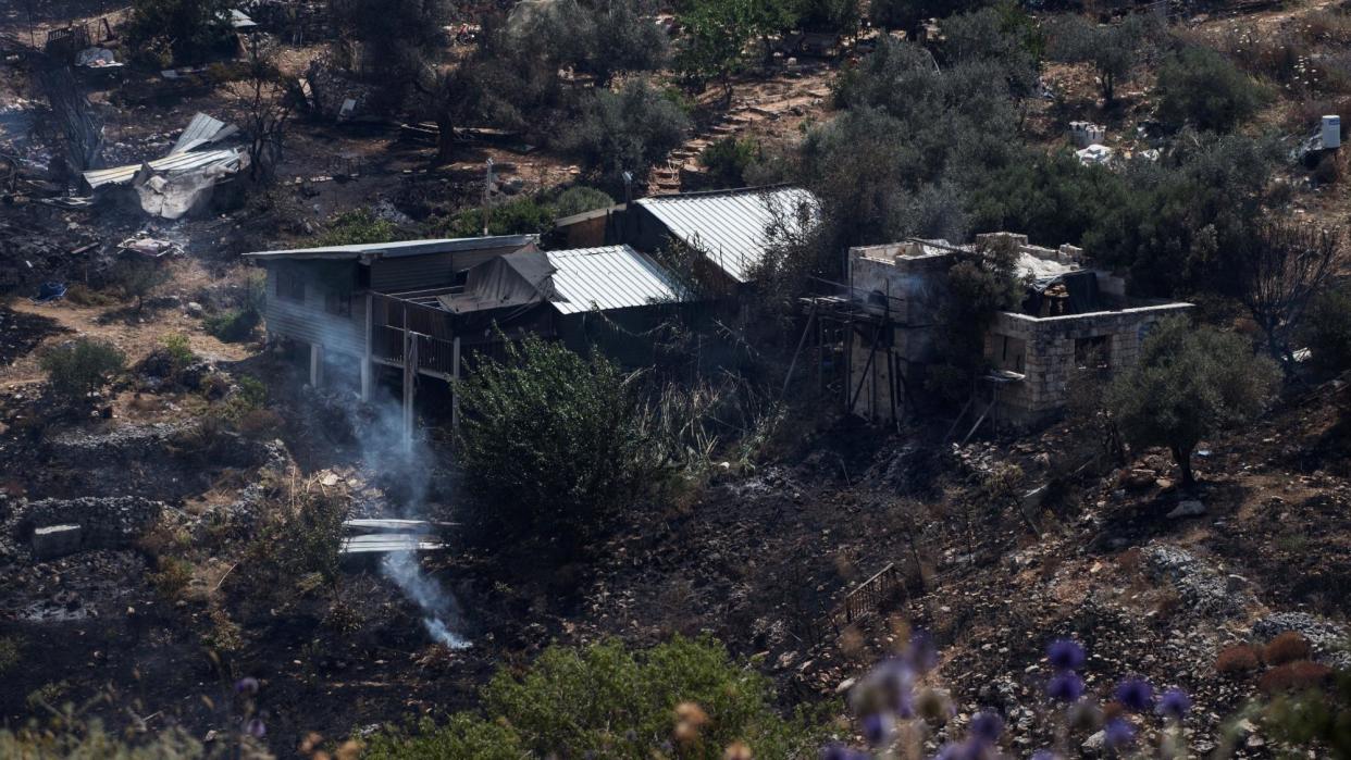 Fire-damaged property and land following a Hezbollah rocket strike in northern Israel (12 June 2024)