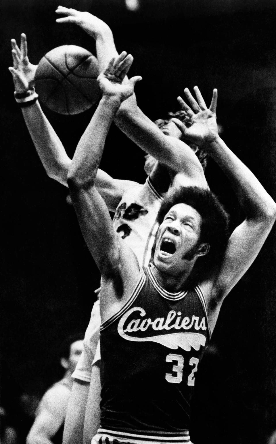 John Johnson of Cleveland battles for a rebound in 1972.