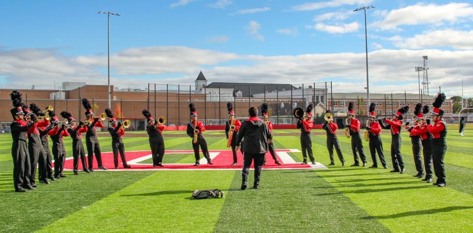 Members of the B.M.C. Durfee High School marching band practice their moves before their performance at the US Bands competition held in Fall River on Sunday, Oct. 22.