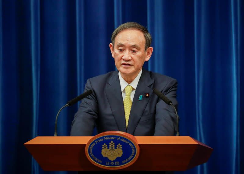 Japanese Prime Minister Yoshihide Suga speaks during a news conference in Tokyo