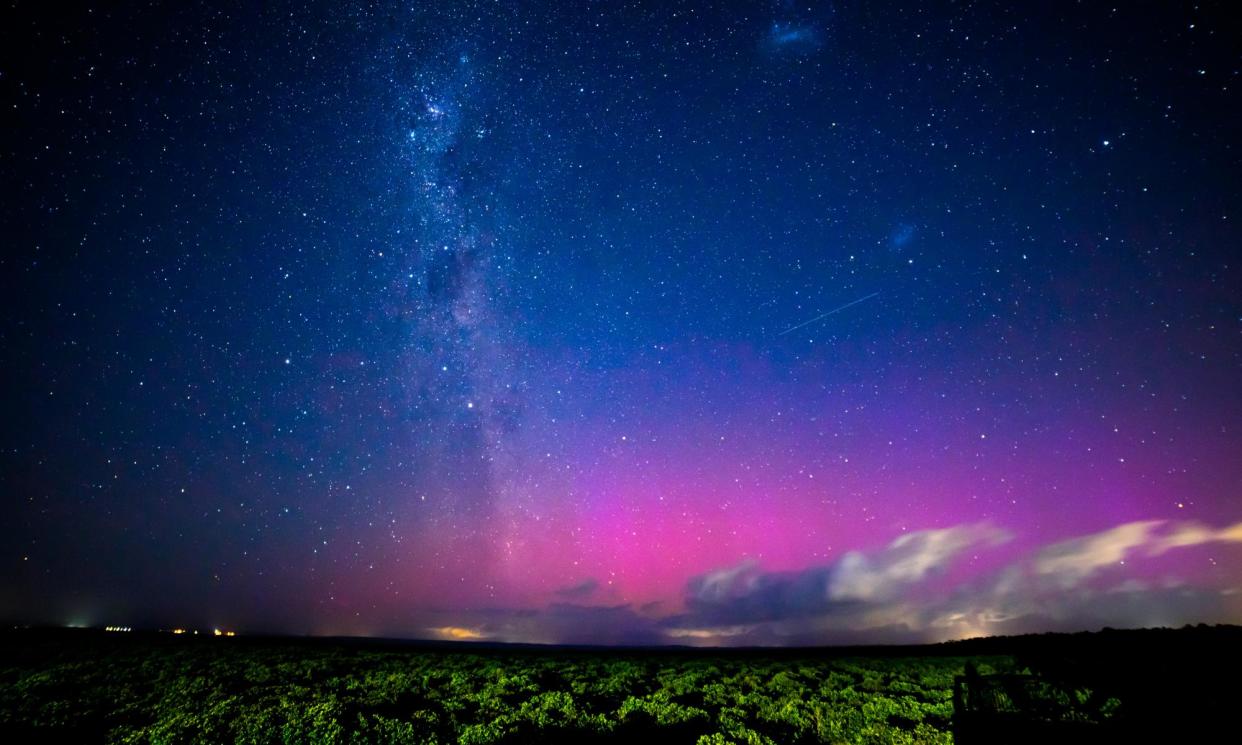 <span>This image of the aurora australis – commonly known as the southern lights – was taken from Blind Bight in Melbourne in 2022. </span><span>Photograph: Chris Putnam/Future Publishing/Getty Images</span>