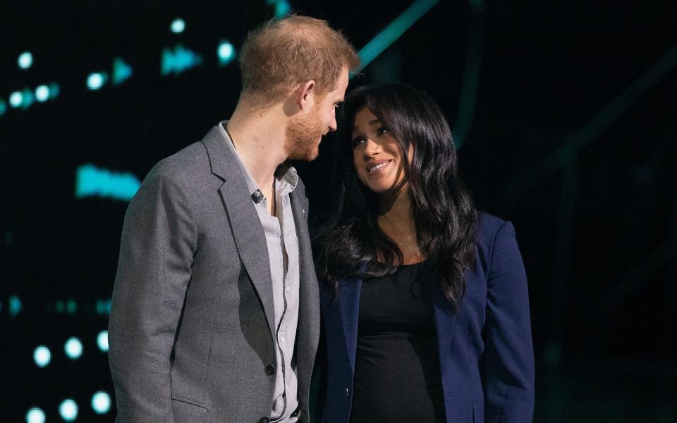The couple on stage at We Day in March 2019 - Jo Hale