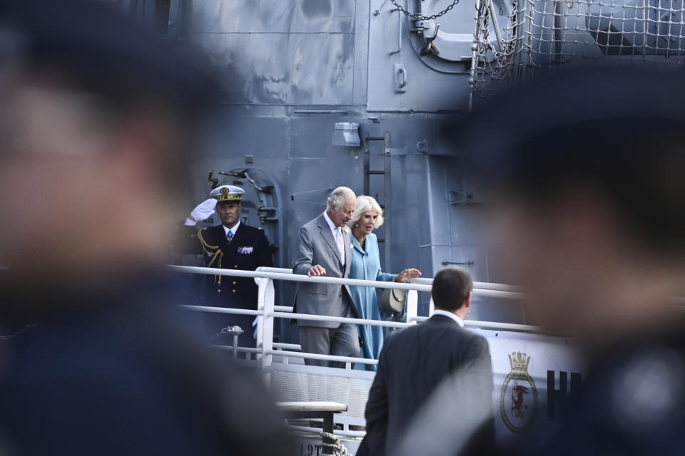 King Charles III disembarks HMS Iron Duke with Queen Camilla, in Bordeaux, southwestern France, Friday Sept. 22, 2023. Britain's King Charles III traveled to Bordeaux on the third day of his state visit to France to focus on climate and the environment. Christophe Archambault, Pool via AP)