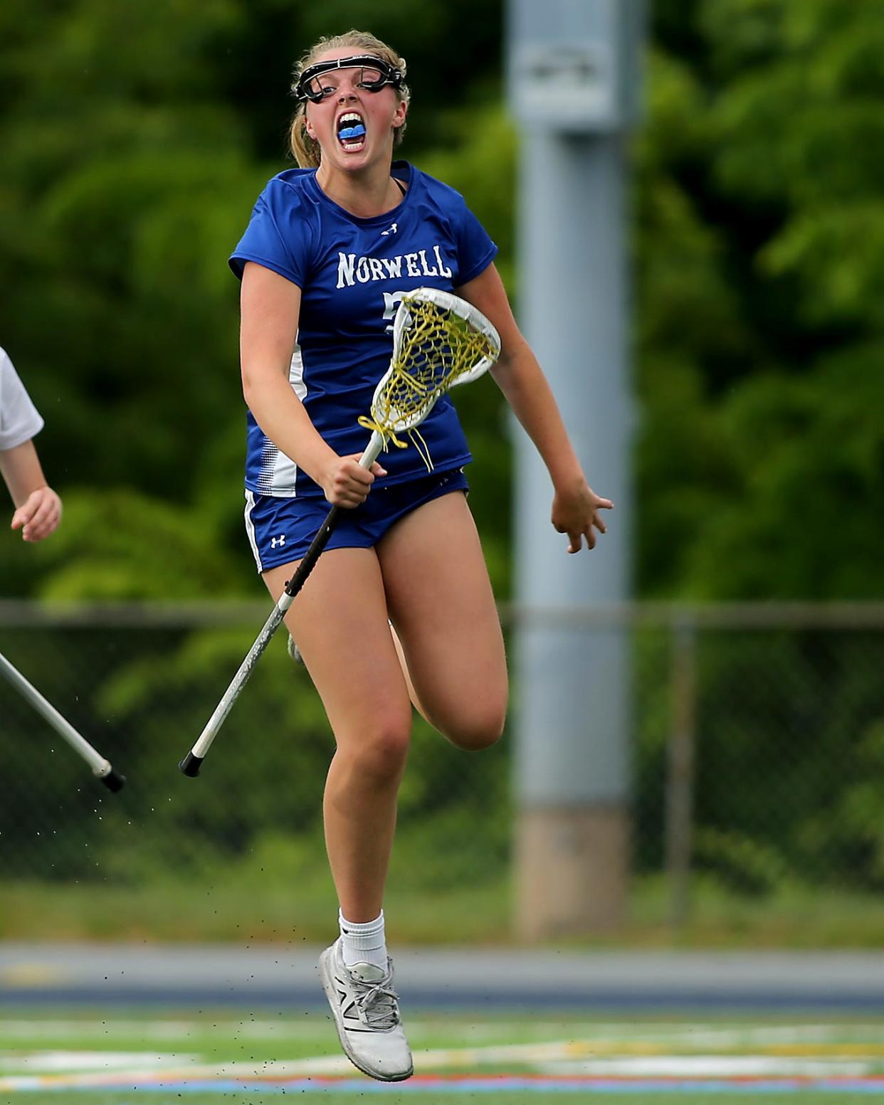 Norwell's Danielle Cox celebrates her goal to give Norwell the 2-1 lead over Cohasset during first half action of their game against Cohasset in the Division 3 Elite 8 game at Cohasset High School on Friday, June 9, 2023. Norwell would win in OT 9-8.