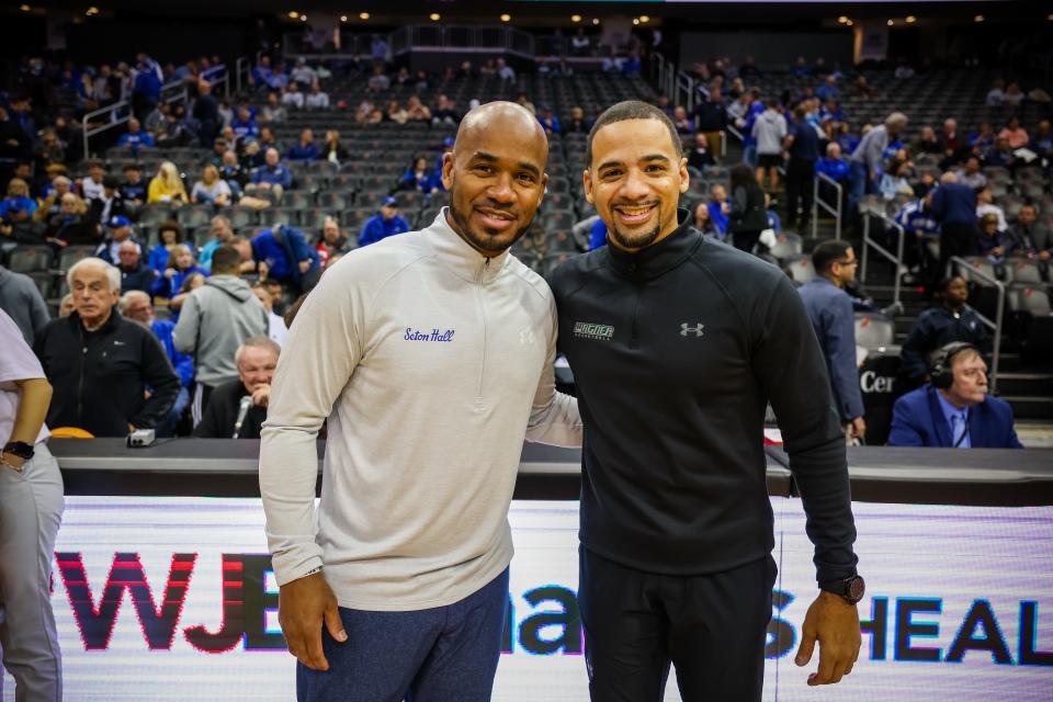 Seton Hall coach Shaheen Holloway (left) with Wagner coach Donald Copeland (right). Both are Hall alums