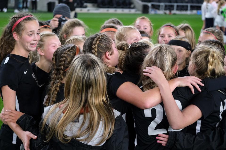 Waynesville celebrates after winning the OHSAA girls Division III state soccer championship against Ottawa-Glendorf at Lower.com Field in Columbus, Ohio, Friday, Nov. 12, 2021.