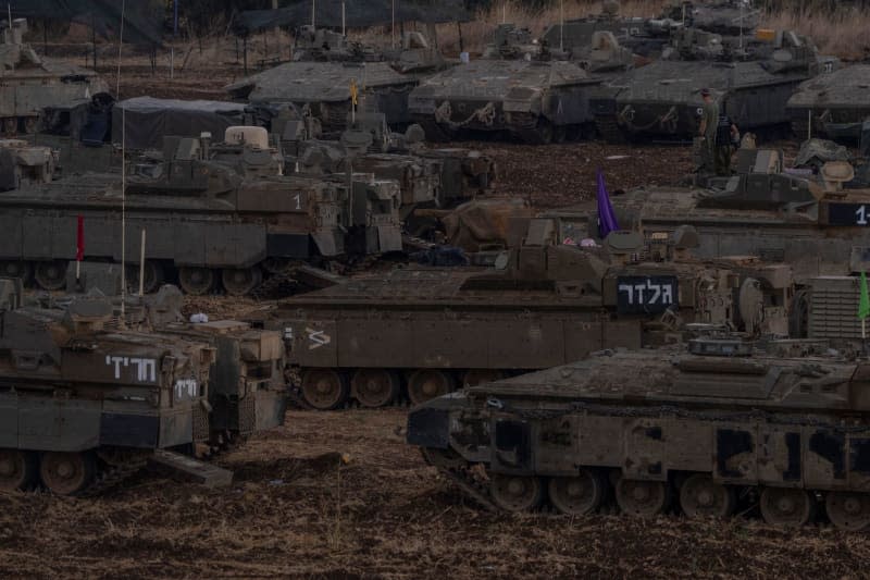 Israeli tanks gather along the Israeli-Lebanese border. The Israeli Army (IDF) had begun "targeted ground attacks based on accurate intelligence," the IDF said in a post on social media platform X. "These targets are located in villages close to the border and pose an immediate threat to Israeli communities in northern Israel." Ilia Yefimovich/dpa