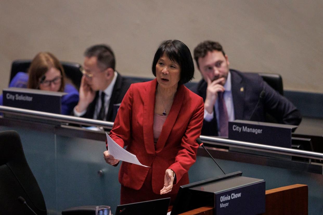 Mayor Olivia Chow, pictured during a budget debate on Feb. 14, said she wouldn't have signed the deal to host 6 FIFA World Cup games without locking down federal and provincial financial contributions. The escalating hosting cost is on city council's agenda this week. (Evan Mitsui/CBC - image credit)