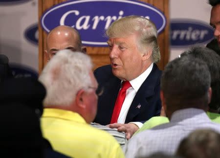 U.S. President-Elect Donald Trump holds an event at Carrier HVAC plant in Indianapolis, Indiana, U.S., December 1, 2016. REUTERS/Chris Bergin