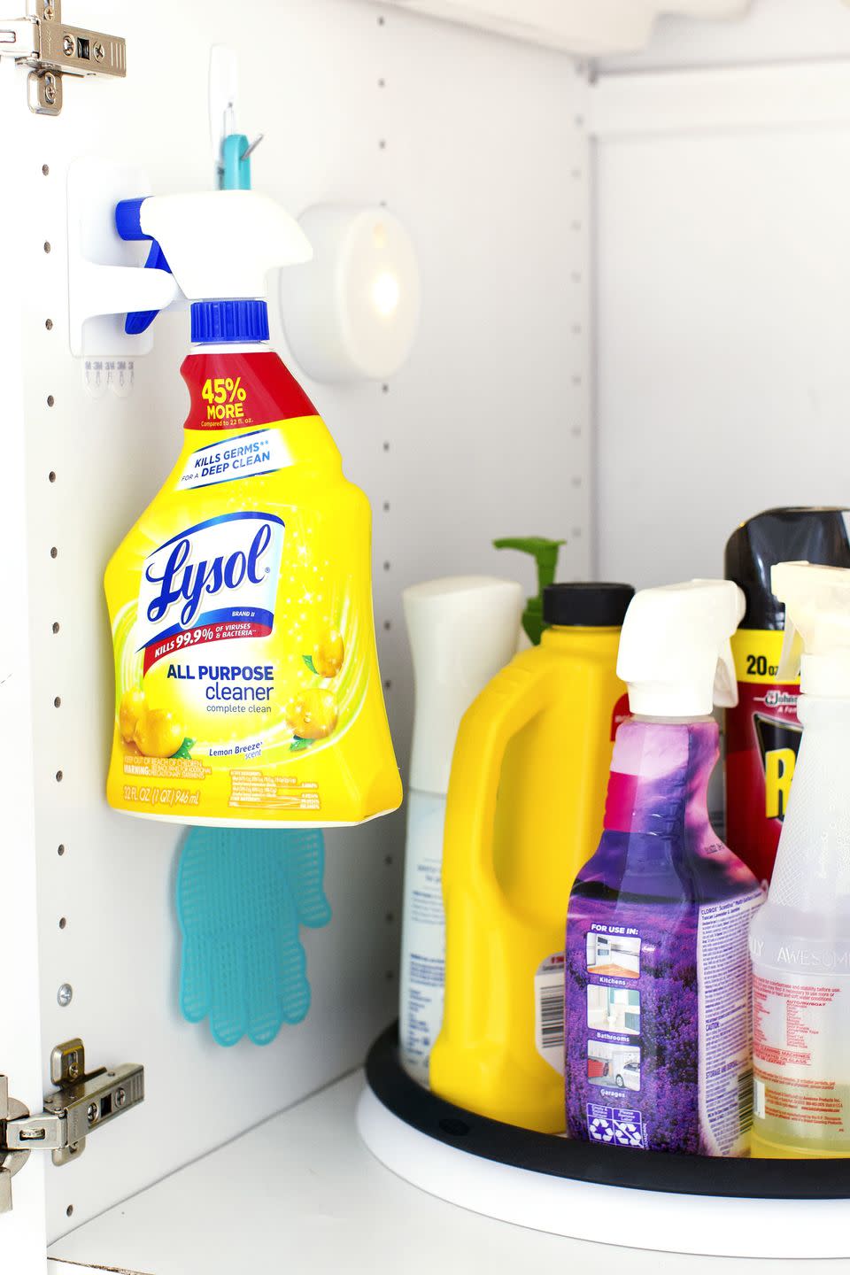 bathroom storage ideas, cleaning supplies on a lazy susan under the sink