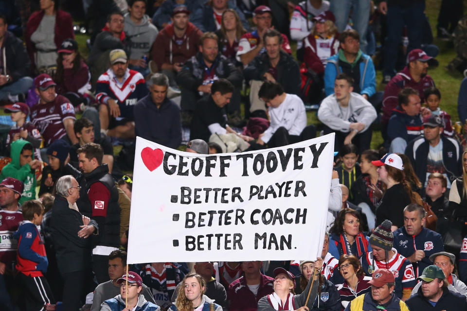 Sea Eagles supporters (pictured) hold up a banner for former coach Geoff Toovey in 2019.