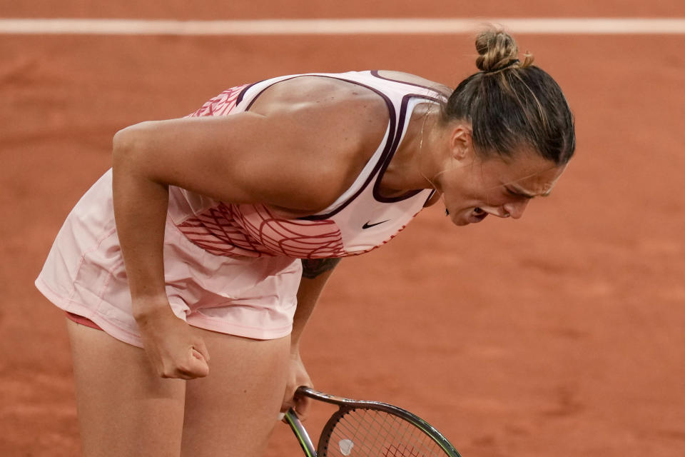 Aryna Sabalenka of Belarus celebrates after winning the first set against Sloane Stephens of the U.S. during their fourth round match of the French Open tennis tournament at the Roland Garros stadium in Paris, Sunday, June 4, 2023. (AP Photo/Thibault Camus)
