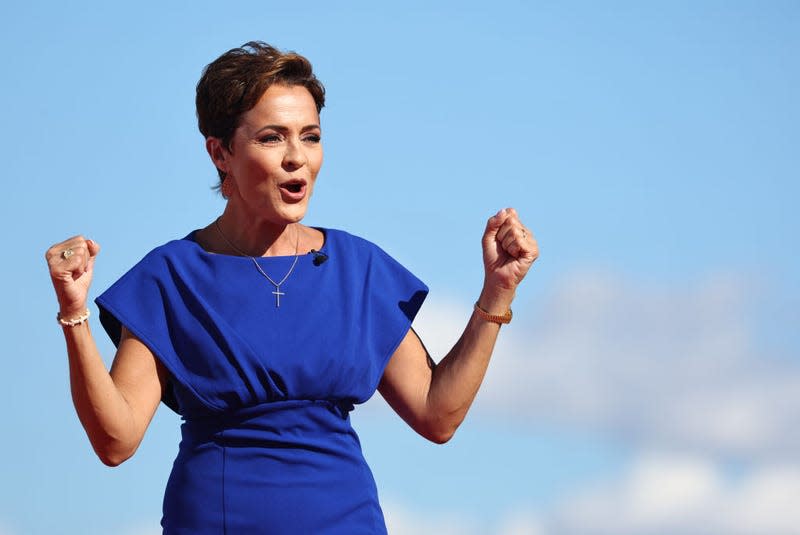 MESA, ARIZONA - OCTOBER 09: Arizona Republican nominee for governor Kari Lake speaks during a campaign rally attended by former U.S. President Donald Trump at Legacy Sports USA on October 09, 2022, in Mesa, Arizona. Trump was stumping for Arizona GOP candidates, including gubernatorial nominee Kari Lake, ahead of the midterm election on November 8.