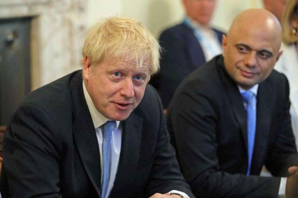 Prime Minister Boris Johnson and Sajid Javid at the first meeting of the new Cabinet (AFP/Getty Images)