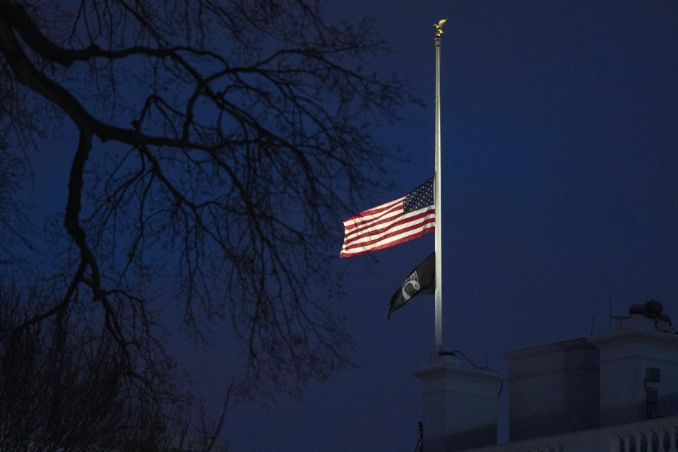 The American flag flies at half-staff at the White House.