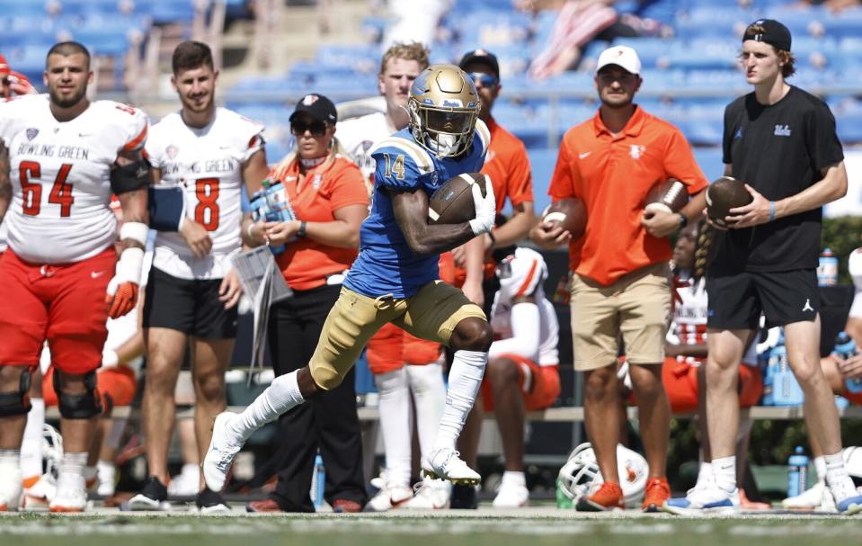 UCLA wide receiver Josiah Norwood sprints for a touchdown during a game against Bowling Green last season.