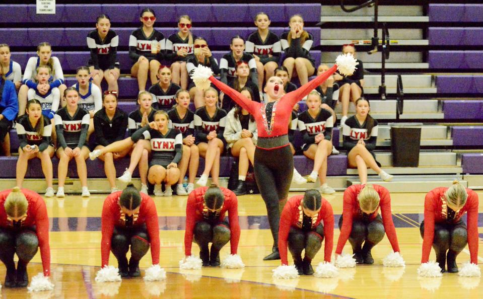 With its cheer squad looking on, Brandon Valley High School's dance team performs its pom routine during the Class AA portion of the South Dakota State Competitive Cheer and Dance Championships on Saturday, Oct. 22, 2022 in the Watertown Civic Arena. The Lynx won the pom division and repeated as the overall state dance champions.