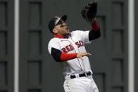 Boston Red Sox's Michael Chavis misses an RBI double by Baltimore Orioles' Rio Ruiz during the sixth inning of a baseball game Tuesday, Sept. 22, 2020, in Boston. (AP Photo/Michael Dwyer)