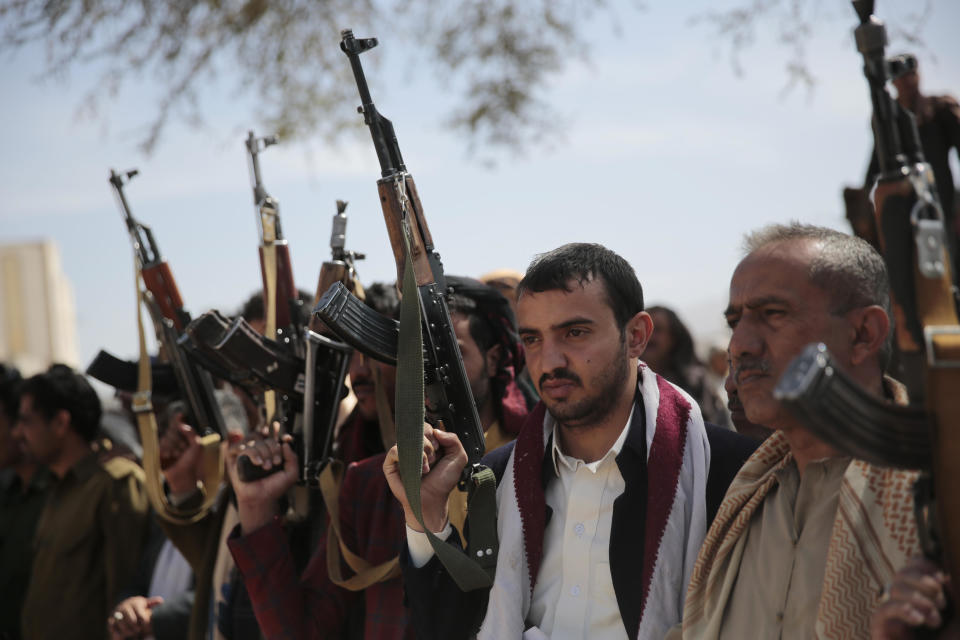 A   November 24, 2021 file photo shows Houthi fighters attending the funeral of fellow rebel fighters killed in fighting with forces of Yemen's internationally recognized government, in Sanaa, Yemen. / Credit: Hani Mohammed/AP