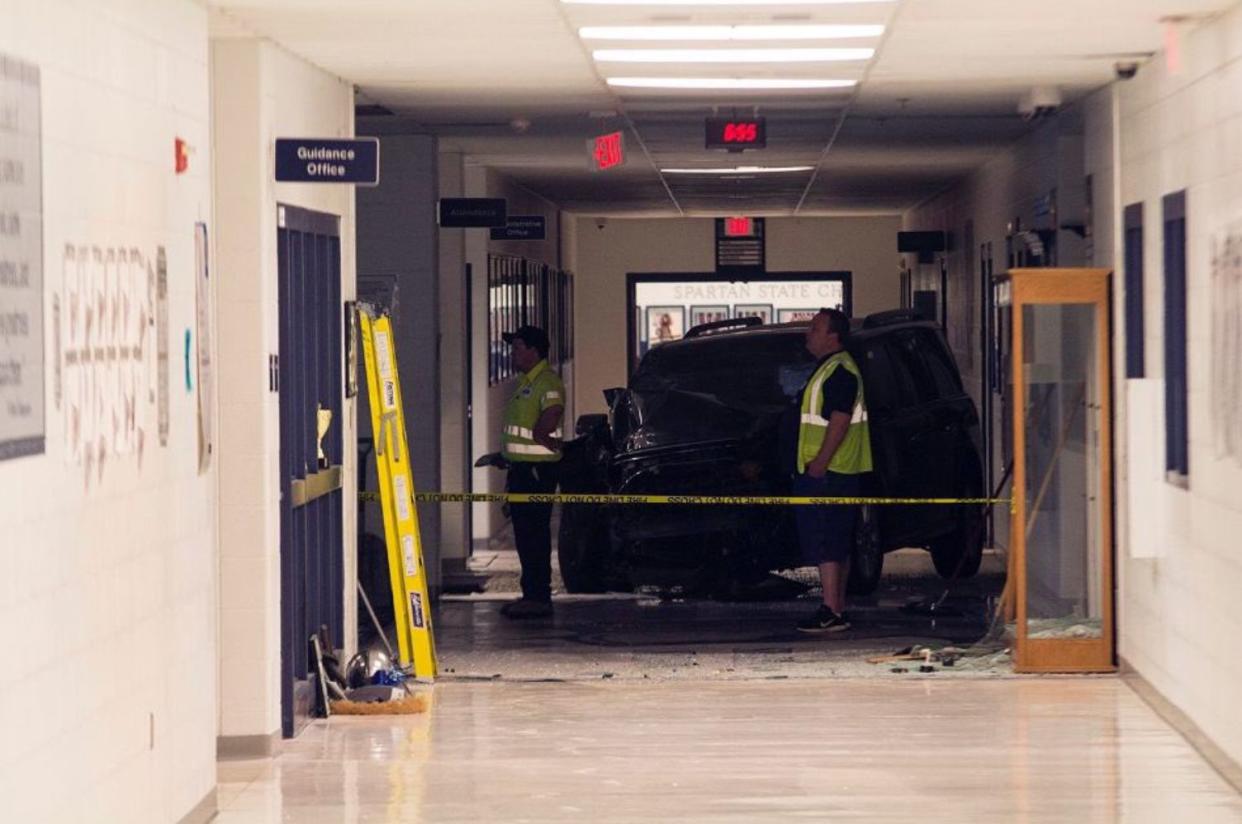 A 16-year-old student drove an SUV through the entrance of Francis Howell Central High School early Wednesday morning. (Photo: Twitter)