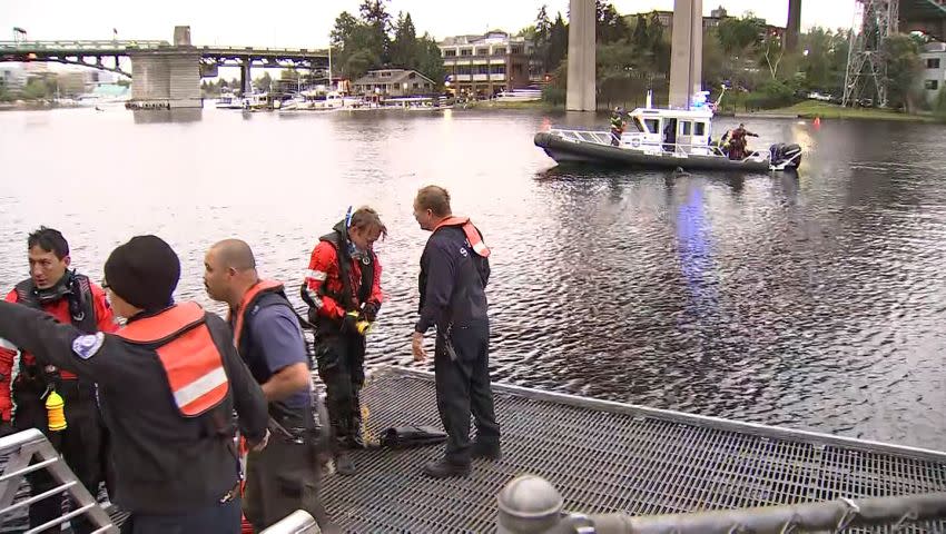 Seattle Fire Department officials said it was believed that the missing driver went into the water as a result of the crash on the bridge, according to witness reports.