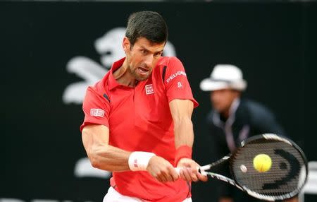 Tennis - Italy Open Men's Singles Final match - Novak Djokovic of Serbia v Andy Murray of Britain - Rome, Italy - 15/5/16 Djokovic returns the ball. REUTERS/Alessandro Bianchi