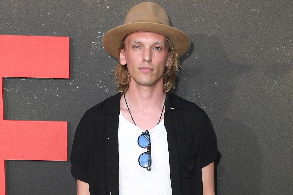Jamie Campbell Bower arrives at the Universal Pictures' "The Black Phone" Los Angeles Premiere