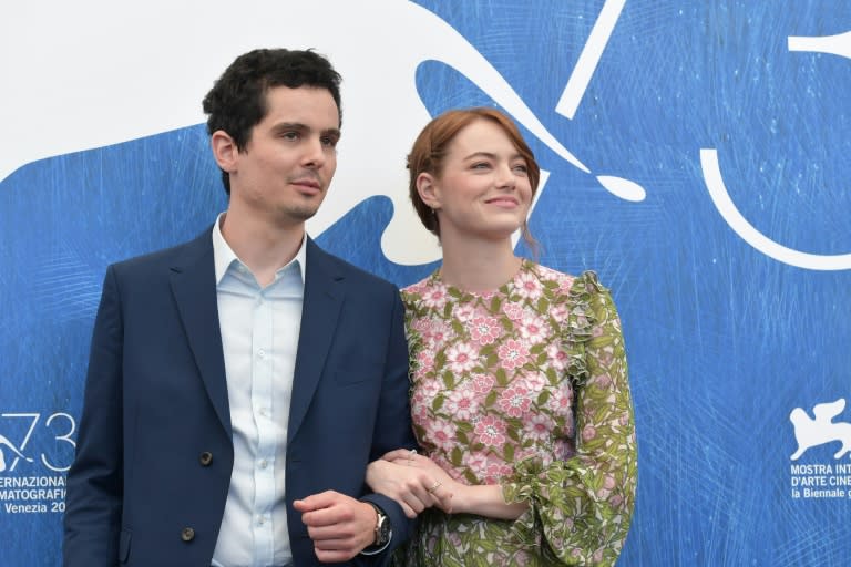 US actress Emma Stone poses with US director Damien Chazelle during the photocall of the movie "La la Land" at the 73rd Venice Film Festival, on August 31, 2016