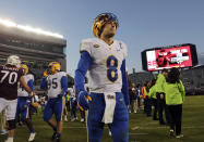 Pittsburgh quarterback Kenny Pickett (8) leaves the field after an NCAA college football game against Virginia Tech, Saturday, Oct. 16, 2021, in Blacksburg, Va. (Matt Gentry/The Roanoke Times via AP)