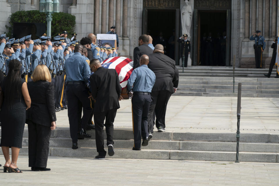Family members and New Jersey State Police officers carry a flag-draped casket holding the body of Lt. Gov. Sheila Oliver into Cathedral Basilica of the Sacred Heart in Newark for a memorial service on Saturday, Aug. 12, 2023. (Julian Leshay/NJ Advance Media via AP)
